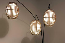 Load image into Gallery viewer, 82" Bronze Three Light Tree Floor Lamp With Beige Wicker Cage Shade