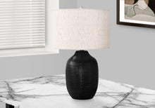 Load image into Gallery viewer, 26" Black Ceramic Urn Table Lamp With Ivory Drum Shade