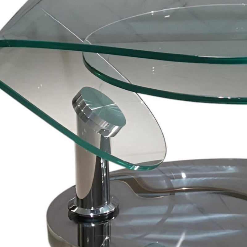 30" Glass And Metal Oval Abstract Coffee Table - Clear And Silver