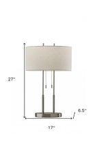 Load image into Gallery viewer, 27" Silver Metal Two Light Bedside Lamp With Off White Drum Shade
