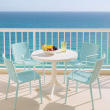 Load image into Gallery viewer, 4 Modern Stackable Plastic Armchair Matched With Round Table

