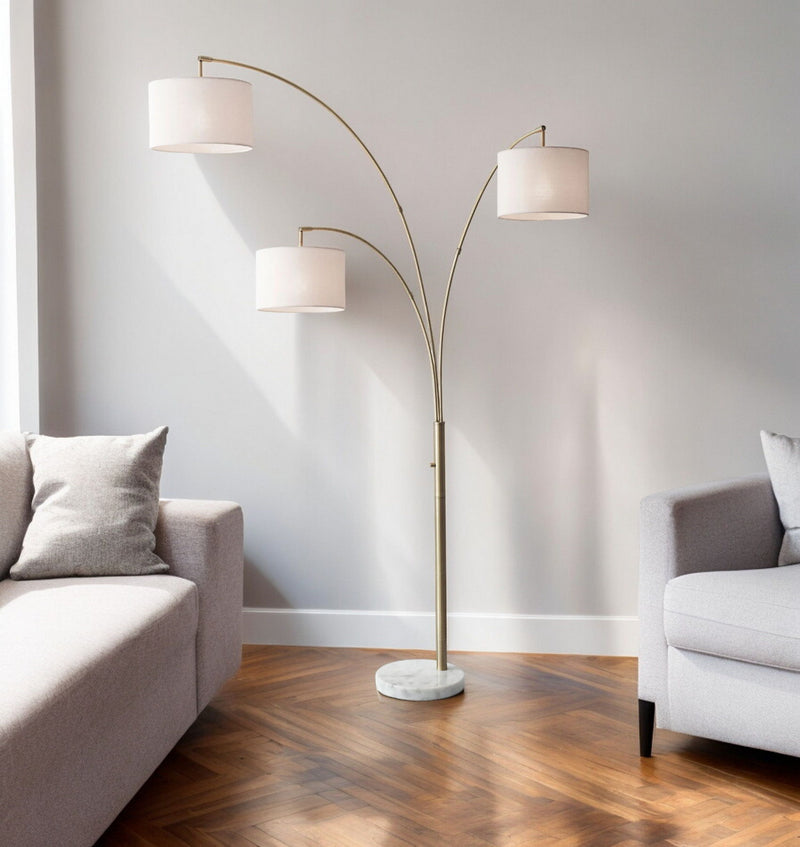 Three Light Arc Floor Lamp With Off-White Fabric Drum Shade - Brass