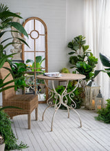 Load image into Gallery viewer, Round Wooden Table With Metal Scrollwork Legs - White Washed
