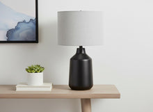 Load image into Gallery viewer, 24" Black Concrete Urn Table Lamp With Gray Drum Shade
