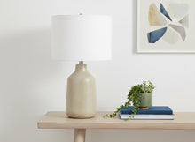 Load image into Gallery viewer, 24" Beige Concrete Urn Table Lamp With Ivory Drum Shade
