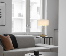 Load image into Gallery viewer, Metal Two Light Candlestick Table Lamp With White Drum Shade - Antiqued Brass
