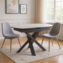 Load image into Gallery viewer, 47" Ceramic And Metal Self-Storing Leaf Cross Leg Base Oval Extendable Dining Table - Gray / White

