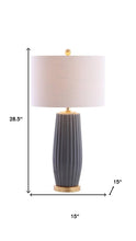 Load image into Gallery viewer, 29" Dark Gray And Gold Table Lamp With Drum Shade
