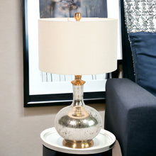 Load image into Gallery viewer, Glass LED Table Lamp With Ivory Drum Shade - Silver Metallic
