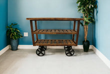 Load image into Gallery viewer, Solid Wood Distressed Wheel Console Table With Storage - Brown And Black
