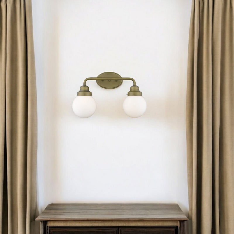 Two Light Wall Sconce With Round Glass Shade - Gold