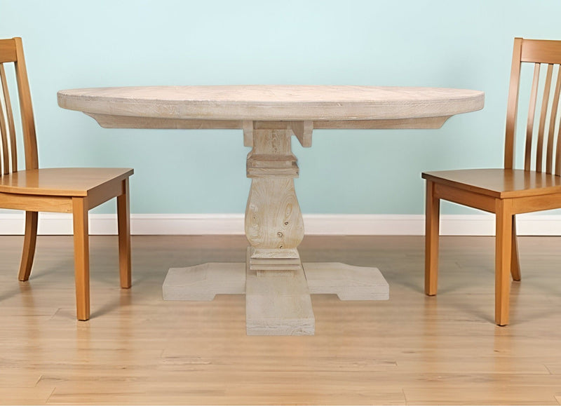 58" Rounded Solid Wood Pedestal Base Dining Table - Natural