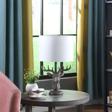 Load image into Gallery viewer, Stag Bust Table Lamp With White Drum Shade - Antiqued Bronzed
