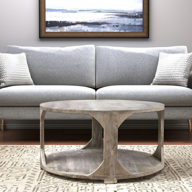 34" Solid Wood Round Distressed Floor Shelf Coffee Table With Shelf - Natural