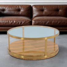 Load image into Gallery viewer, Glass Wood And Metal Round Coffee Table With Shelf - Clear Gold And Brown
