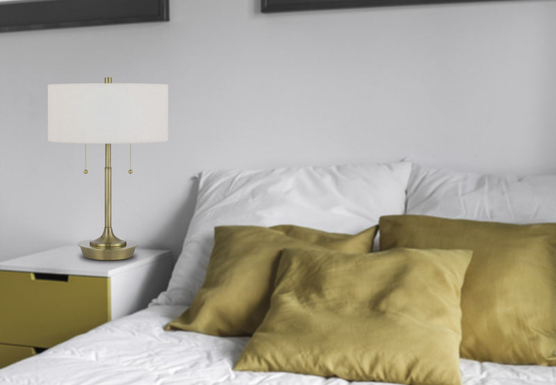 Metal Two Light Candlestick Table Lamp With White Drum Shade - Antiqued Brass